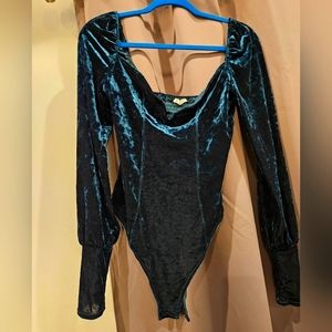 Green Free People velvet body suit size medium. NEVER WORN.